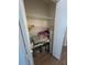 Open linen closet with wire shelving, used for storage at 23 Juniper Pass Ln, Ocala, FL 34480