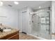 Updated bathroom with granite counters and glass enclosed shower at 234 Locust Pass Loop, Ocala, FL 34472