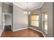 Cozy dining area with hardwood floors, natural light, and access to the kitchen at 234 Locust Pass Loop, Ocala, FL 34472