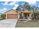 Beautiful single Gathering home with a well maintained lawn and landscaping at 234 Locust Pass Loop, Ocala, FL 34472