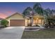 Charming single Gathering home with a well maintained lawn and landscaping at 234 Locust Pass Loop, Ocala, FL 34472
