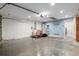 Spacious two car garage with high ceilings, overhead lighting, and plenty of room for storage at 234 Locust Pass Loop, Ocala, FL 34472