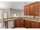 Kitchen featuring granite countertops, stainless steel appliances and lots of storage space at 234 Locust Pass Loop, Ocala, FL 34472