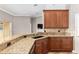 Kitchen featuring granite countertops, stainless steel appliances and lots of cabinet space at 234 Locust Pass Loop, Ocala, FL 34472