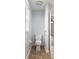 Bright powder room includes updated fixtures and tile flooring at 234 Locust Pass Loop, Ocala, FL 34472