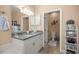 Well-appointed bathroom with granite countertop vanity, updated fixtures, and a separate toilet room at 3060 Ne 35Th St, Ocala, FL 34479