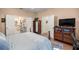 Bedroom with ensuite bathroom and walk-in closet with generous space and natural lighting at 3060 Ne 35Th St, Ocala, FL 34479