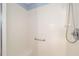 Stand-up shower with a shower seat and tiled walls at 3321 Woodridge Dr, The Villages, FL 32162