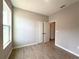 Bedroom featuring tile floors and closet at 3628 Sw 133Rd Loop, Ocala, FL 34473