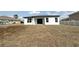 View of the backyard and exterior of the home at 3628 Sw 133Rd Loop, Ocala, FL 34473