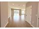 Bright foyer leads to an open-concept living area with tile flooring and lots of natural light at 3628 Sw 133Rd Loop, Ocala, FL 34473