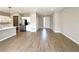 Spacious open-concept living space with tile floors, stainless appliances, and ample natural light at 3628 Sw 133Rd Loop, Ocala, FL 34473