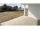 Covered patio area overlooking the spacious backyard with room for entertaining at 3628 Sw 133Rd Loop, Ocala, FL 34473