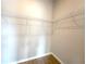 Walk-in closet with metal shelving for ample storage at 3628 Sw 133Rd Loop, Ocala, FL 34473