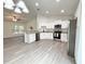 Open-concept kitchen featuring stainless steel appliances and granite countertops at 3896 Sw 177Th Ter, Dunnellon, FL 34432