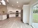 Well-lit kitchen with granite countertops and stainless steel appliances at 3896 Sw 177Th Ter, Dunnellon, FL 34432