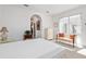 Bright bedroom with a light color palette, sliding doors, and ample natural light at 5891 Nw 26Th St, Ocala, FL 34482