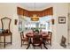 Cozy breakfast nook with natural light, a round table, and a view to the exterior at 5891 Nw 26Th St, Ocala, FL 34482