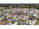 Aerial shot of a planned residential community featuring neat landscaping, diverse architectural styles, and neighborhood streets at 5891 Nw 26Th St, Ocala, FL 34482