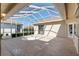 Spacious lanai with a caged pool and patio at 5891 Nw 26Th St, Ocala, FL 34482