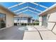 Spacious lanai with a caged pool, and seating at 5891 Nw 26Th St, Ocala, FL 34482