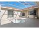 Screened-in lanai with in-ground pool perfect for outdoor living and entertaining at 5891 Nw 26Th St, Ocala, FL 34482