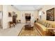 Inviting living room showcasing neutral walls, a plush carpet, and traditional decor elements at 5891 Nw 26Th St, Ocala, FL 34482