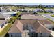 Aerial view of a lovely home featuring a screened-in lanai for enjoying the outdoors at 5891 Nw 26Th St, Ocala, FL 34482
