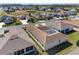 Aerial of house, emphasizing its outdoor living space and neat landscaping in a peaceful neighborhood at 5891 Nw 26Th St, Ocala, FL 34482