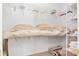 Organized walk-in closet with shelving and storage for clothing and personal items at 5891 Nw 26Th St, Ocala, FL 34482