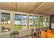 Enclosed sun room with beautiful views of the community lake at 615 Midway Dr # B, Ocala, FL 34472