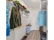 Walk-in closet with wood floors and storage shelves for organization at 7908 Sw 89Th Cir, Ocala, FL 34481