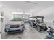 Spacious two car garage with golf cart and ample room for vehicles at 7908 Sw 89Th Cir, Ocala, FL 34481