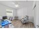 Well-lit home office with a ceiling fan and modern desk at 7908 Sw 89Th Cir, Ocala, FL 34481