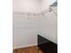 Small closet with wire rack shelving and vinyl laminate wood look flooring at 8342 Sw 82Nd Loop, Ocala, FL 34481