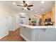Beautiful kitchen features a breakfast bar, stainless steel appliances and light wood cabinetry at 8342 Sw 82Nd Loop, Ocala, FL 34481