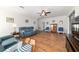 Open-concept living area with hardwood floors and crown molding throughout at 8342 Sw 82Nd Loop, Ocala, FL 34481