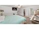 Inviting bedroom features a soft bed, storage, and access to a walk-in closet and bathroom at 8350 Sw 93Rd Ln # C, Ocala, FL 34481
