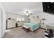 Bright bedroom with a plush bed, two dressers, and ample natural light, perfect for relaxation at 8350 Sw 93Rd Ln # C, Ocala, FL 34481