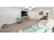 Bright living room with cozy seating, neutral decor, and a ceiling fan for added comfort at 8350 Sw 93Rd Ln # C, Ocala, FL 34481