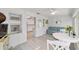 View of the sunroom that features plenty of natural light, white trim, and access to the kitchen at 8350 Sw 93Rd Ln # C, Ocala, FL 34481