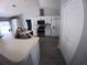 Modern kitchen with sleek countertops, stainless steel appliances, and ample cabinet space at 8890 Sw 33Rd Ct, Ocala, FL 34476
