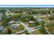 A neighborhood aerial view of single-Gathering homes with mature trees and well-maintained lawns at 8917 Sw 101St Ln, Ocala, FL 34481