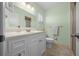 Bathroom featuring a vanity, tiled flooring, and a combined shower and tub at 8917 Sw 101St Ln, Ocala, FL 34481