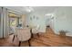 Bright dining area with glass table and sliding door access to the lanai at 8917 Sw 101St Ln, Ocala, FL 34481