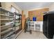 A storage room or workshop space with shelving, pegboard, and organization for tools and supplies at 8917 Sw 101St Ln, Ocala, FL 34481