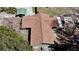 An aerial shot of a well-maintained roof, a deck, and a car port for the house at 10370 Sw 110Th St, Dunnellon, FL 34432