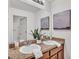 Bathroom with double sinks, granite countertop, and modern fixtures at 1073 Vinsetta Cir, Winter Garden, FL 34787