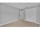 Bedroom featuring carpet, baseboards, and closet at 1073 Vinsetta Cir, Winter Garden, FL 34787