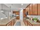 Well-equipped kitchen with stainless steel appliances and ample counter and cabinet space at 1073 Vinsetta Cir, Winter Garden, FL 34787